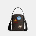 Coach Outlet Tristan Crossbody Bag 14 In Signature Canvas With Patches